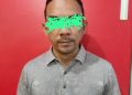 Tersangka yang diamankan Satreskrim Polresta Tanjungpiang usai menjalani pemeriksaan, foto : Mael/detak.media