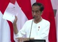 Presiden Jokowi dalam Pemberian Nomor Induk Berusaha kepada UMK Perseorangan, GOR Toware, Jayapura, Papua, Rabu, 31 Agustus 2022. YouTube/Sekretariat Presiden