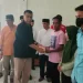 Bupati Natuna Wan Siswandi menyerahkan secara langsung bantuan hasil penggalangan dana, untuk korban longsor Serasan (foto : ist)