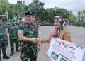 Mayjen TNI Syafei saat Menyerahkan Semenisasi Jalan di Desa Lancang Kuning Kabupaten Bintan, foto: Mael/detak.media