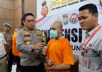 Pelaku MA saat Menjalani Konferensi Pers Kasus Pencurian dan Kekerasan, serta Percobaan Pemerkosaan, foto: Mael/detak.media